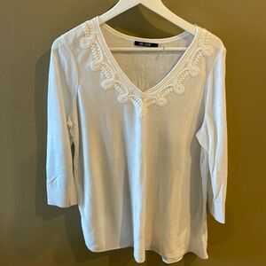 Flattering 3/4 sleeve soft V neck with embroidered neckline winter white